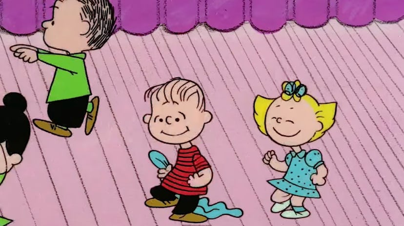 A Still from 'A Charlie Brown Christmas'; Linus and Sally are dancing with the rest of the kids