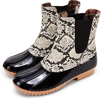 a pair of snakeskin rain boots