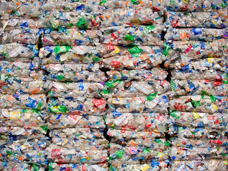 Stacks of compressed plastic products for recycling