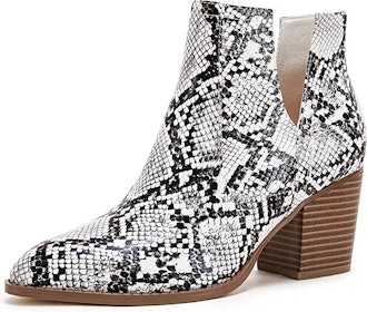 a pair of snakeskin booties with a cutout detail