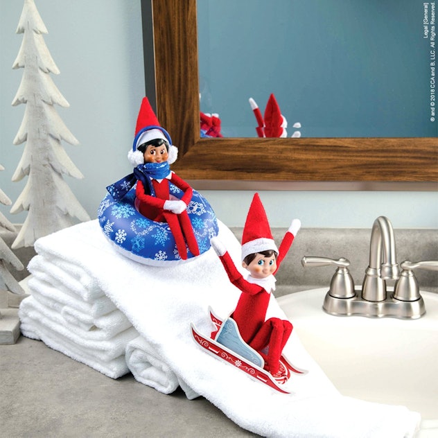 Two Elves on the Shelf can go sledding together on a homemade mountain. 