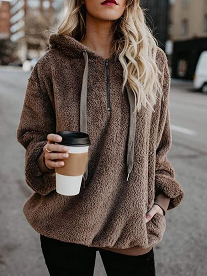 Want a sweatshirt that’s soft and cute? Check out this sherpa hoodie.