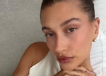 Hailey Bieber taking a selfie at home where she also inspires TikTokers to show off how to make Hail...
