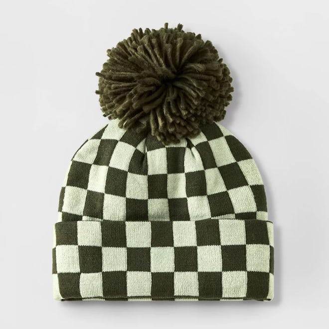 Non-toy gift ideas for kids, like a warm beanie, reduce clutter around the house.