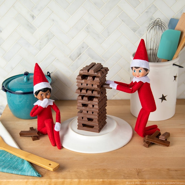 One idea for 2 elves on the shelf is to have them play Jenga with chocolate. 