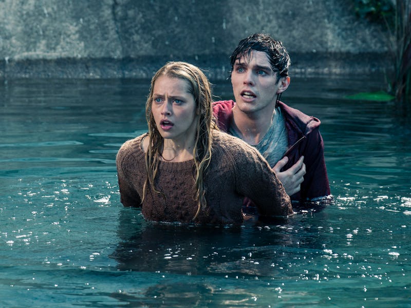 Teresa Palmer stands in front of Nicholas Hoult in Warm Bodies