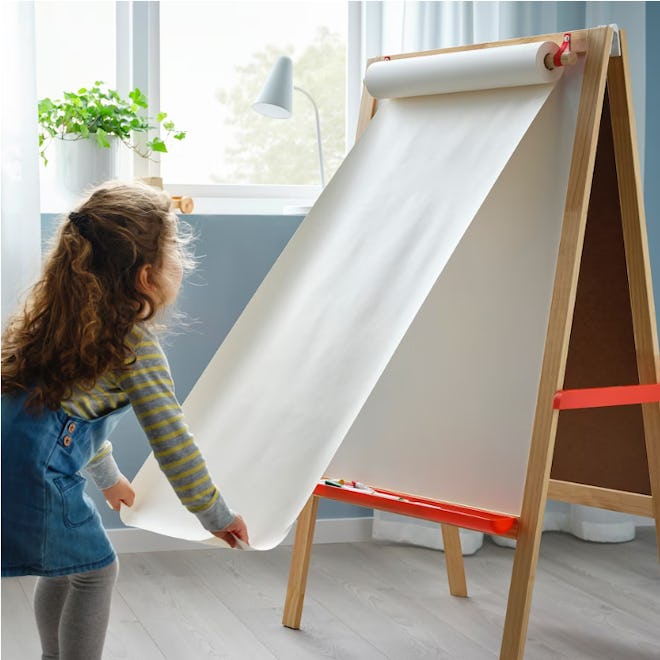 An easel for artwork is an inspiring non-toy gift idea for kids.