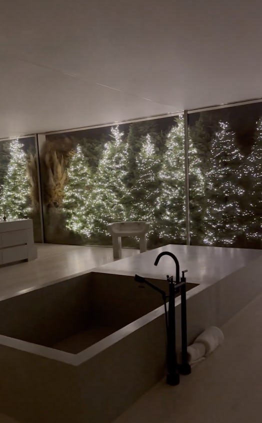 Kim Kardashian Christmas trees are placed outside her bathroom for holiday decor inspiration. 