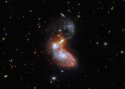 Webb captured this merging galaxy pair with a pair of its cutting-edge instruments: NIRCam – the Nea...
