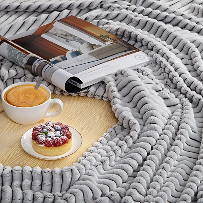 A cozy gray throw blanket is the perfect Great British Baking Show gift for avid rewatchers.