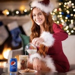 Lindsay Lohan donned her Mean Girls holiday outfit to try out the latest TikTok trend of dirty sodas...