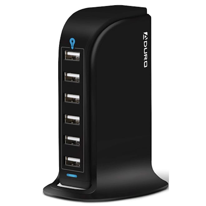 This vertical charging station fits on top of your nightstand and can charge up to six devices at on…