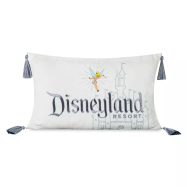 The Disney 100th anniversary begins in January with new merch like this throw pillow. 