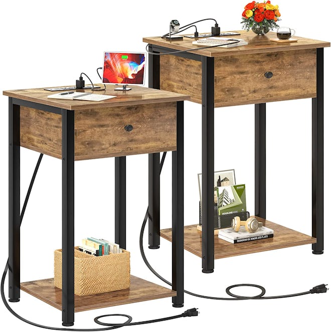 These two nightstands each have three built-in power outlets and two USB ports to charge multiple de...