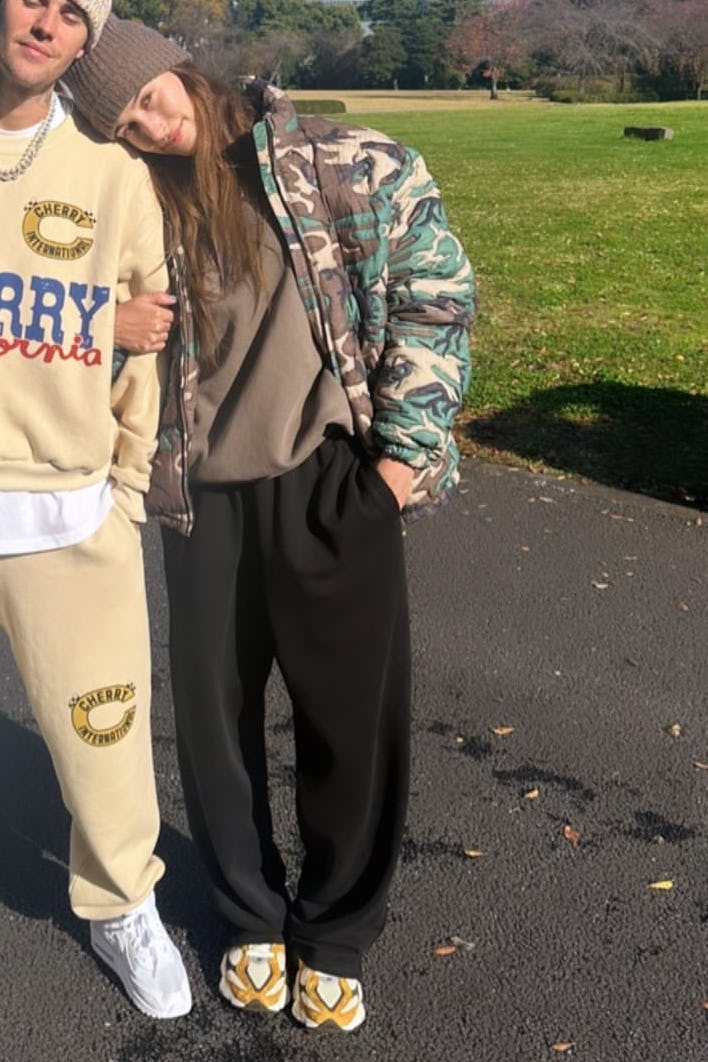 hailey bieber wearing a camouflage print jacket
