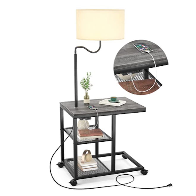 This charging station is built-in to a nightstand and includes a lamp and wheels for convenient mobi...