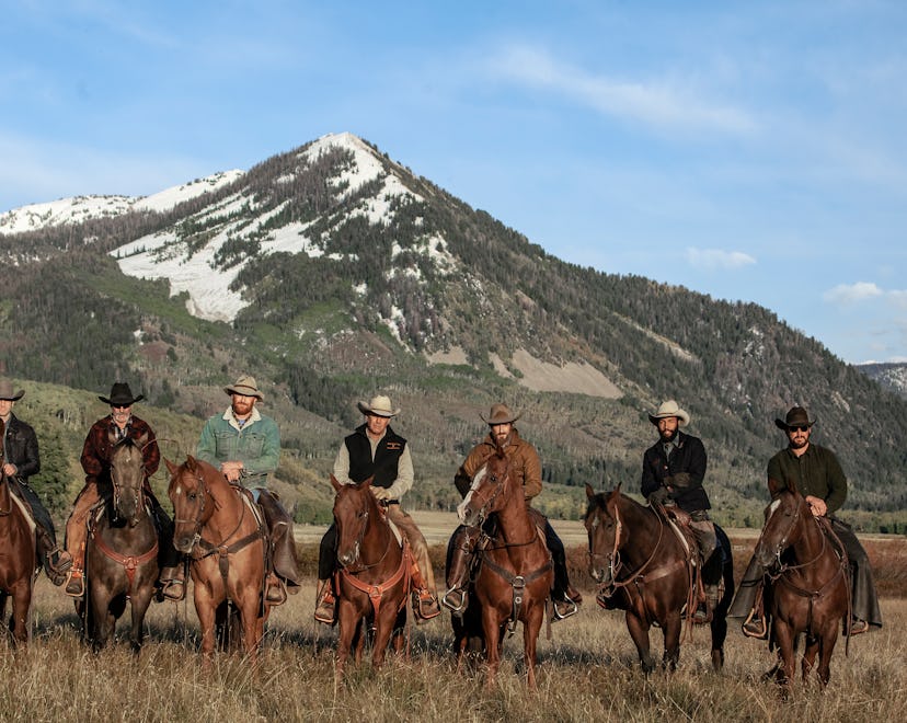 Cast of cowboys in a scene from 'Yellowstone' on Paramount+.