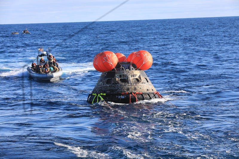 The Orion capsule bobbing in the water