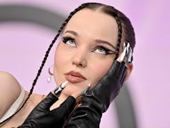 Dove Cameron wearing double eyeliner, the 2023 beauty trend for her zodiac sign.