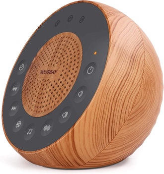 This white noise machines for loud neighbors has a faux wood design and more than 30 sound options.