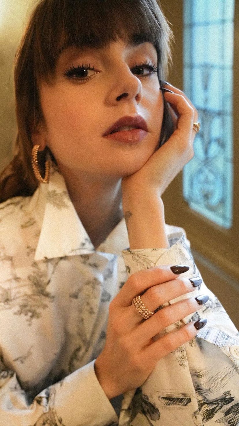 Lily Collins long brown nails