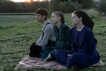 August (Ben Whishaw) with Ona and Salome Friesen (Rooney Mara and Claire Foy). 
