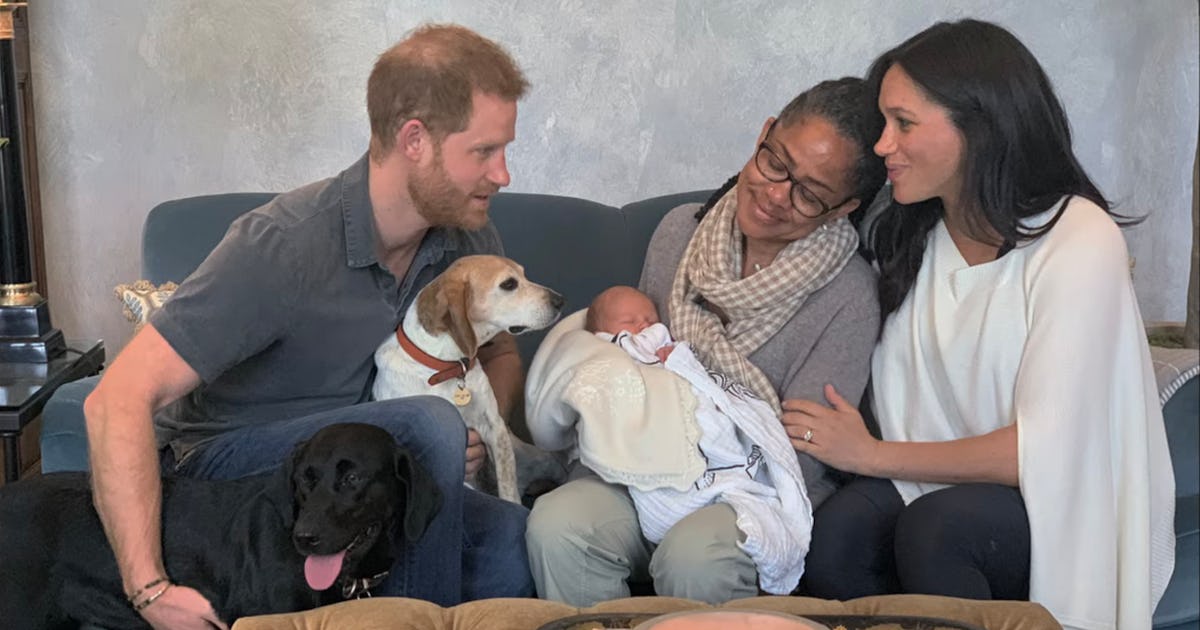 27 Photos Of Prince Harry & Meghan Markle With Dogs