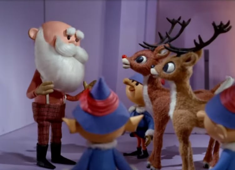 Claymation Santa talking to Rudolph et al
