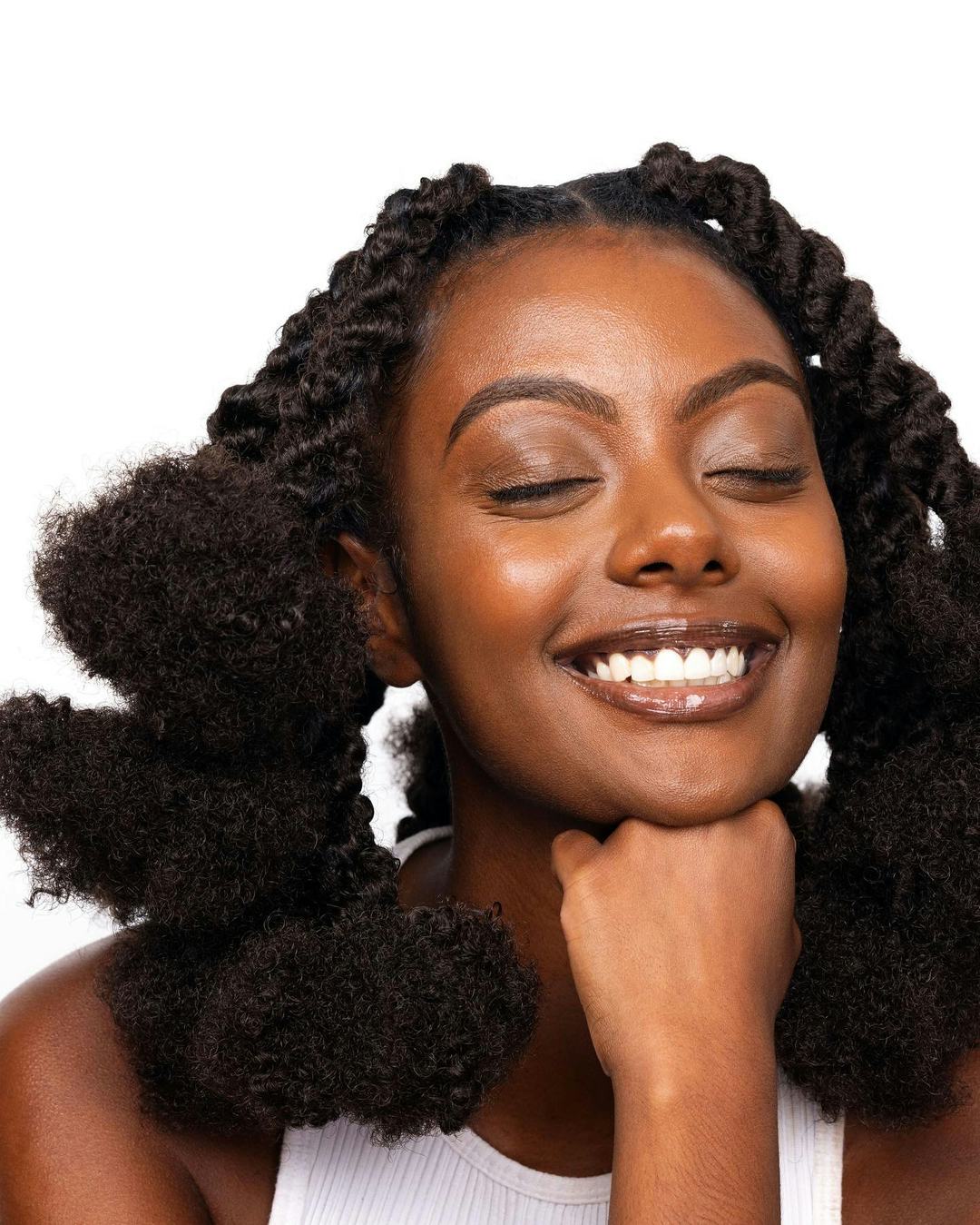 Ami Cole for sephora highlighter model with eyes closed