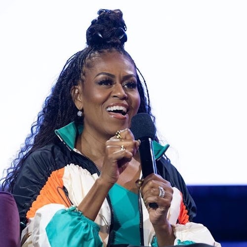 Michelle Obama braids top knot on book tour 2022