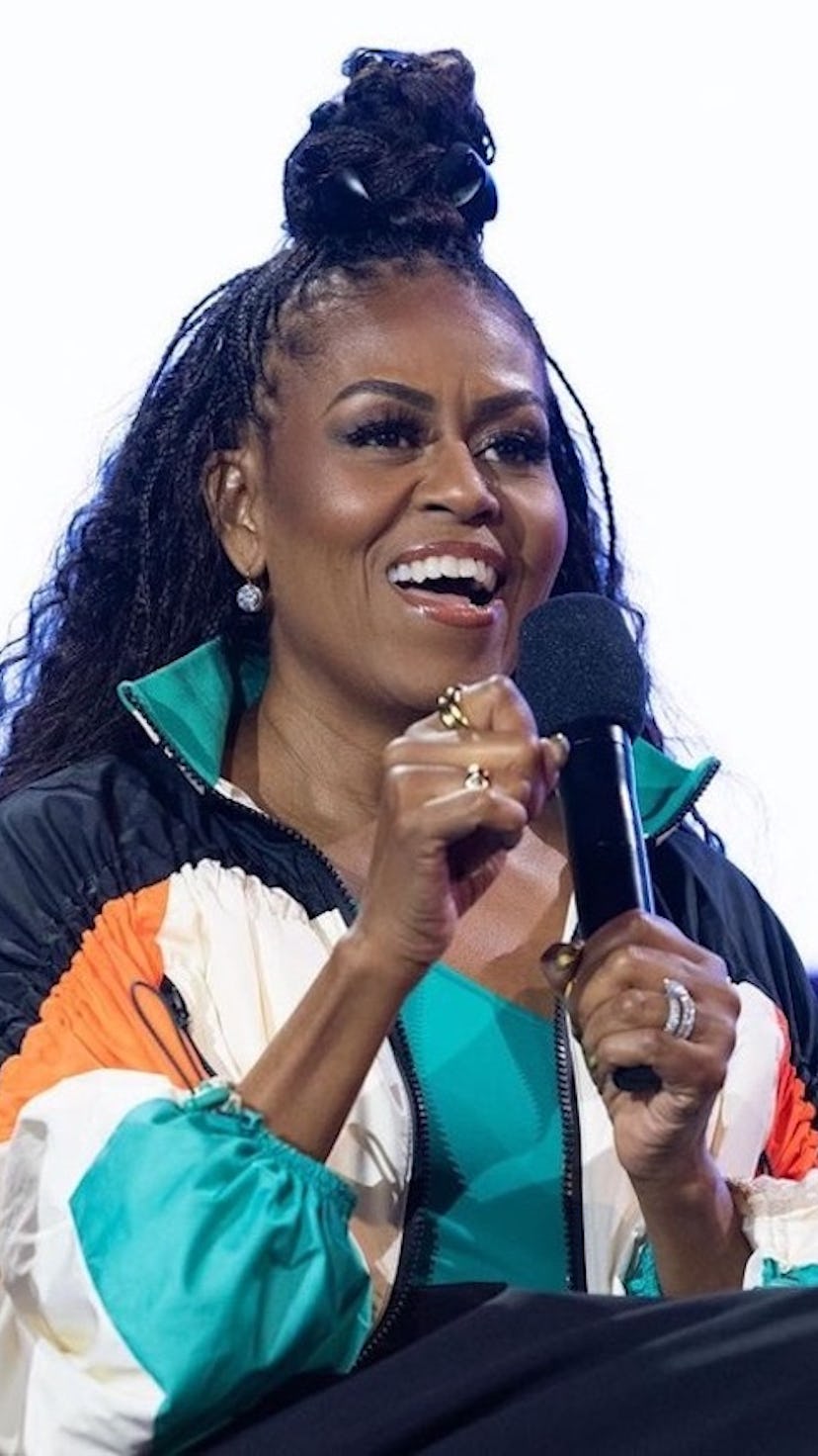 Michelle Obama braids top knot on book tour 2022