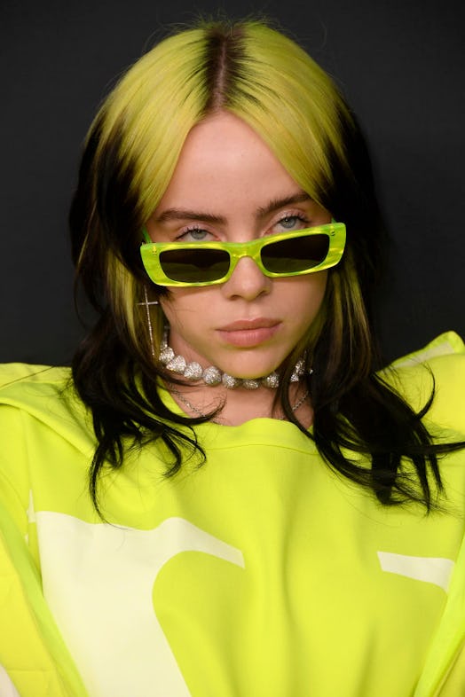 Apply some temporary neon dye to your roots to hide unwanted growth.