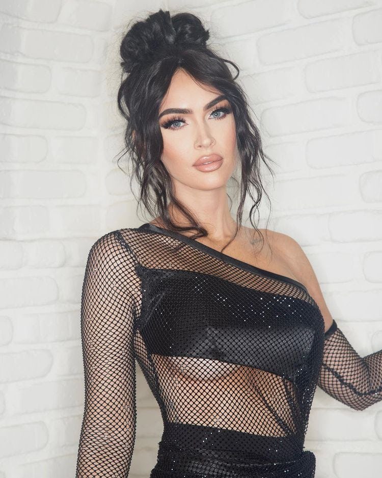 Try a high bun to hide your roots.