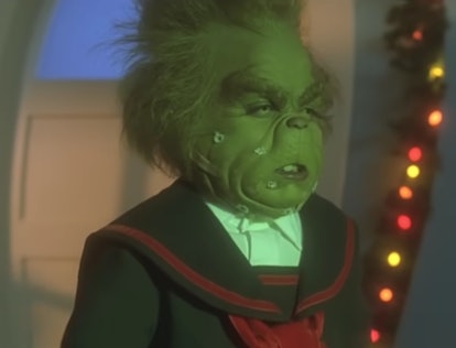 The Grinch as a child sporting blood toilet paper on his face where he cut himself shaving.