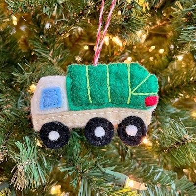 A felt Christmas ornament shaped like a garbage truck, a cute Christmas gift for trash collectors