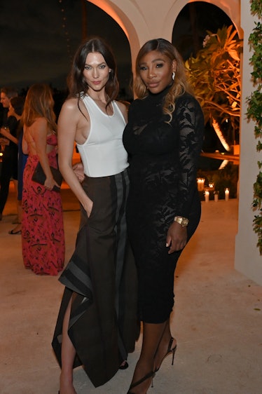 Karlie Kloss in Burberry and Serena Williams attend the W Magazine and Burberry Art Basel party in M...