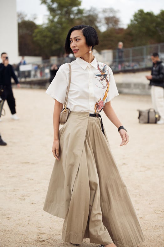 Molly Chiang in a pleated maxi skirt