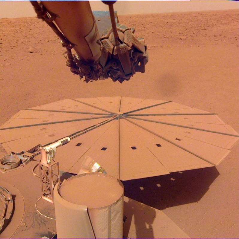 Insight's circular solar panel covered in dust