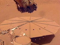 Insight's circular solar panel covered in dust