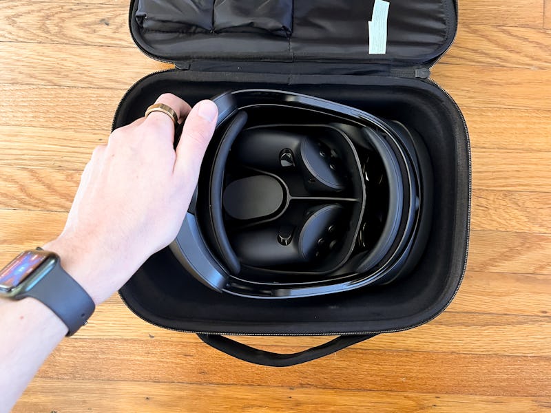 Taking out the Quest Pro from its carrying case.