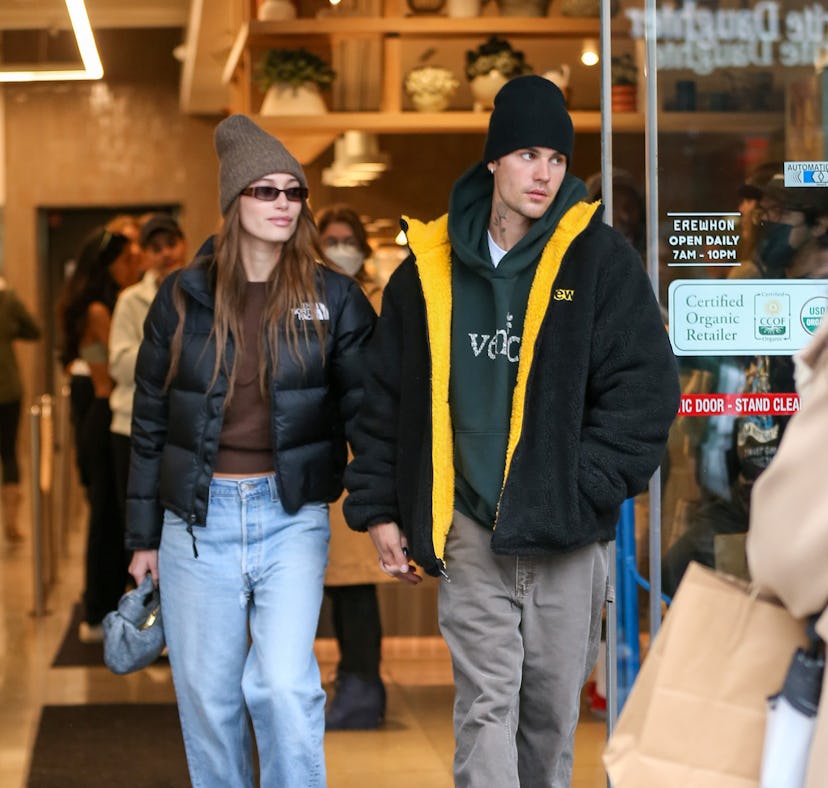 Justin and Hailey Bieber, wearing a cropped puffer jacket.