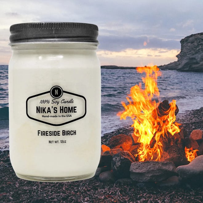 This soy candle can burn up to 60 hours, comes in a reusable mason jar, and gives off a fireside sce...