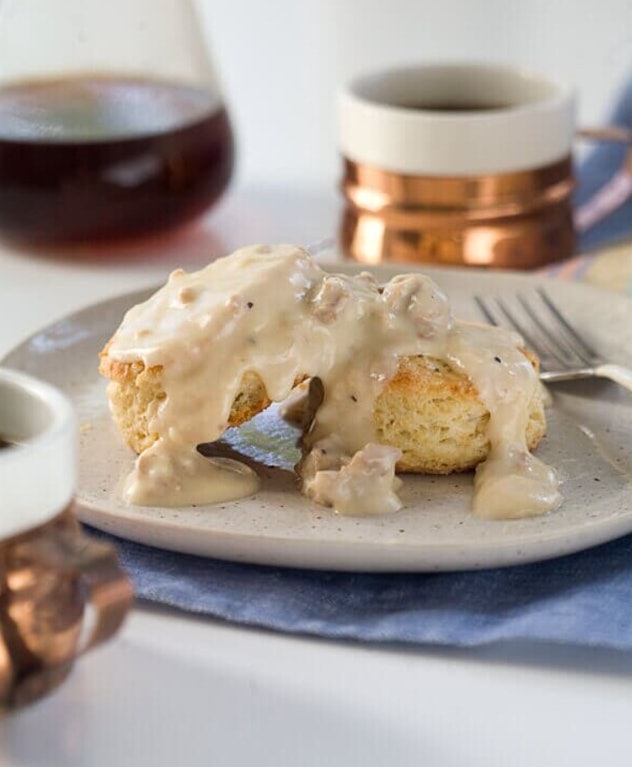 Spicy sausage country gravy with buttermilk biscuits is one of the best Christmas breakfast ideas.
