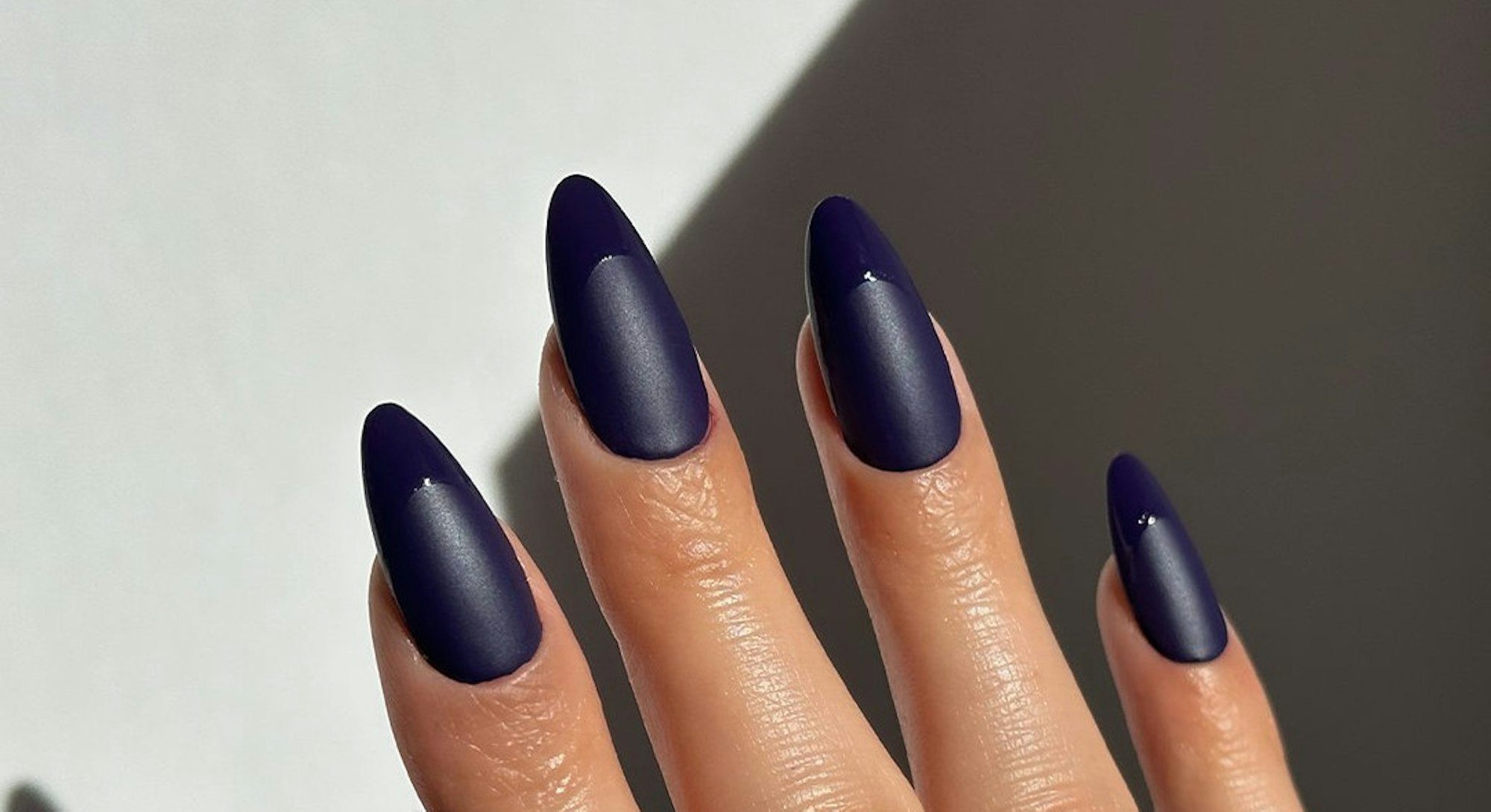 Try matte nail art with shiny French tips for Capricorn season.