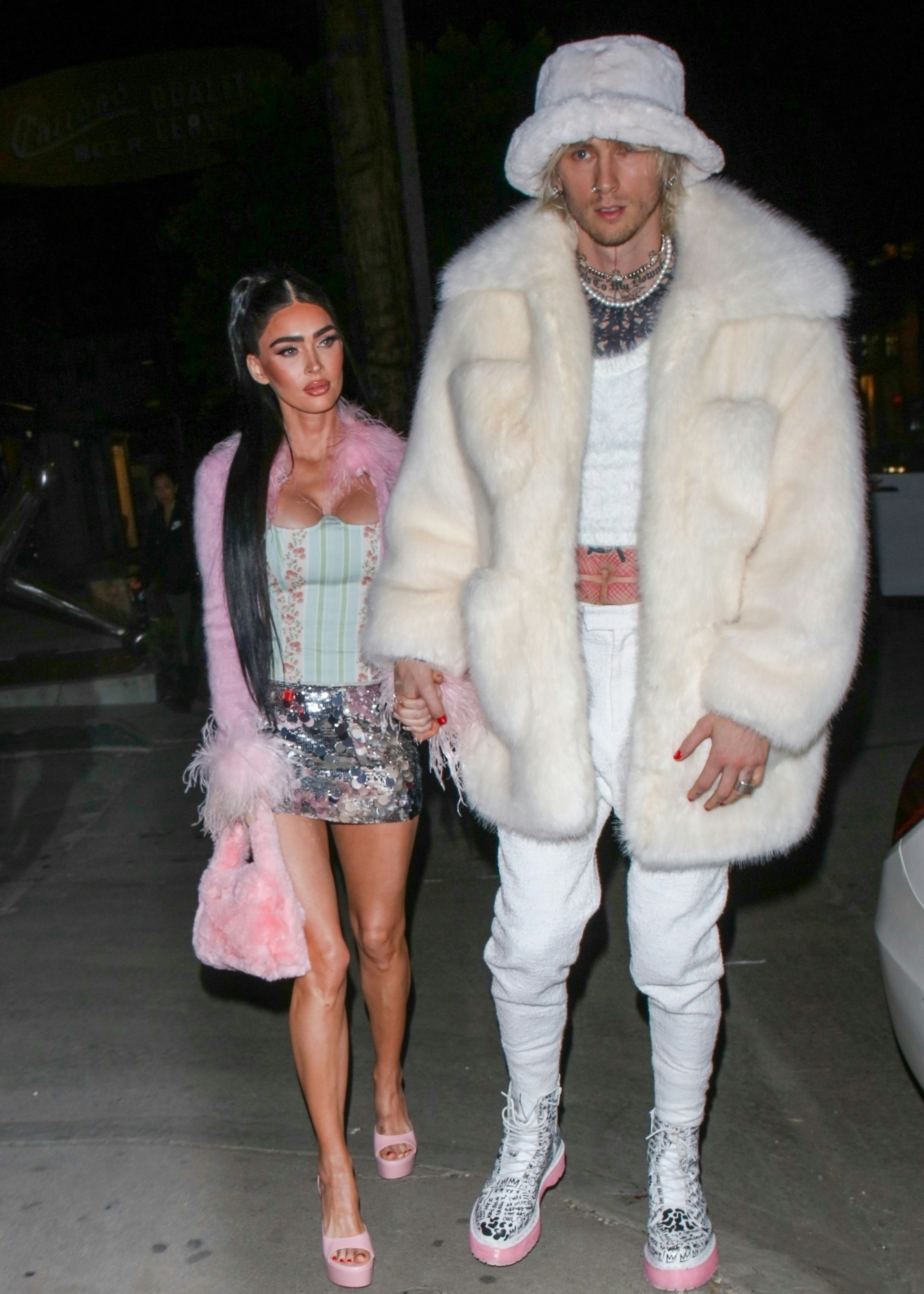 Megan Fox Goes Barbiecore in Pink Bra Top, Pumps & Fuzzy Hat in