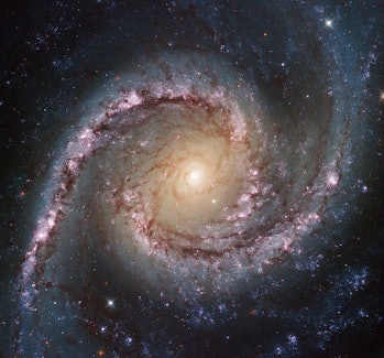 Color image of a spiral galaxy in deep space