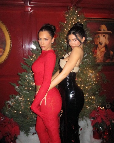 Kylie Jenner and friend Anastasia in front of christmas tree