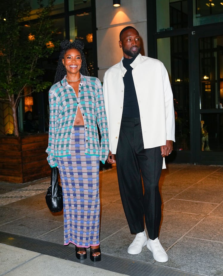 Gabrielle Union and Dywane Wade depart their hotel on October 07, 2022 in New York City.