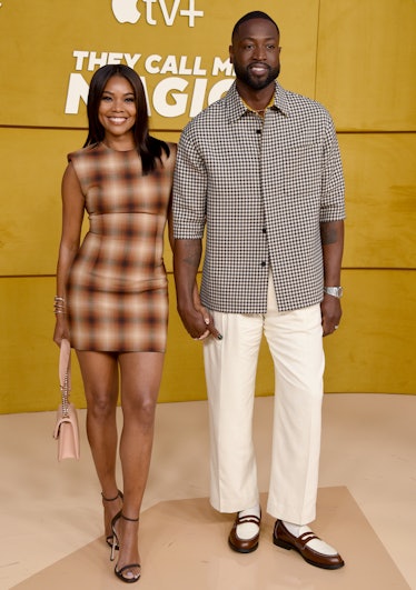 Dwyane Wade and Gabrielle Union attend the Los Angeles Premiere Of Apple's "They Call Me Magic" at R...