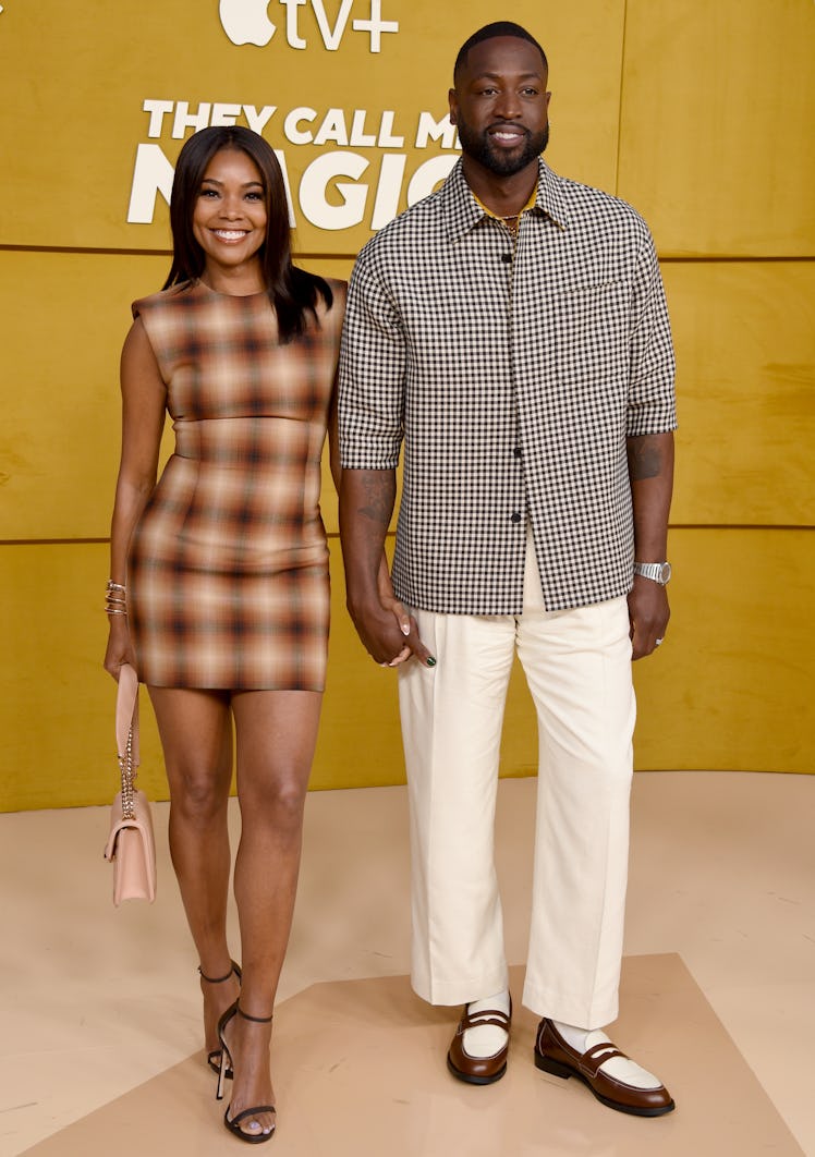 Dwyane Wade and Gabrielle Union attend the Los Angeles Premiere Of Apple's "They Call Me Magic" at R...